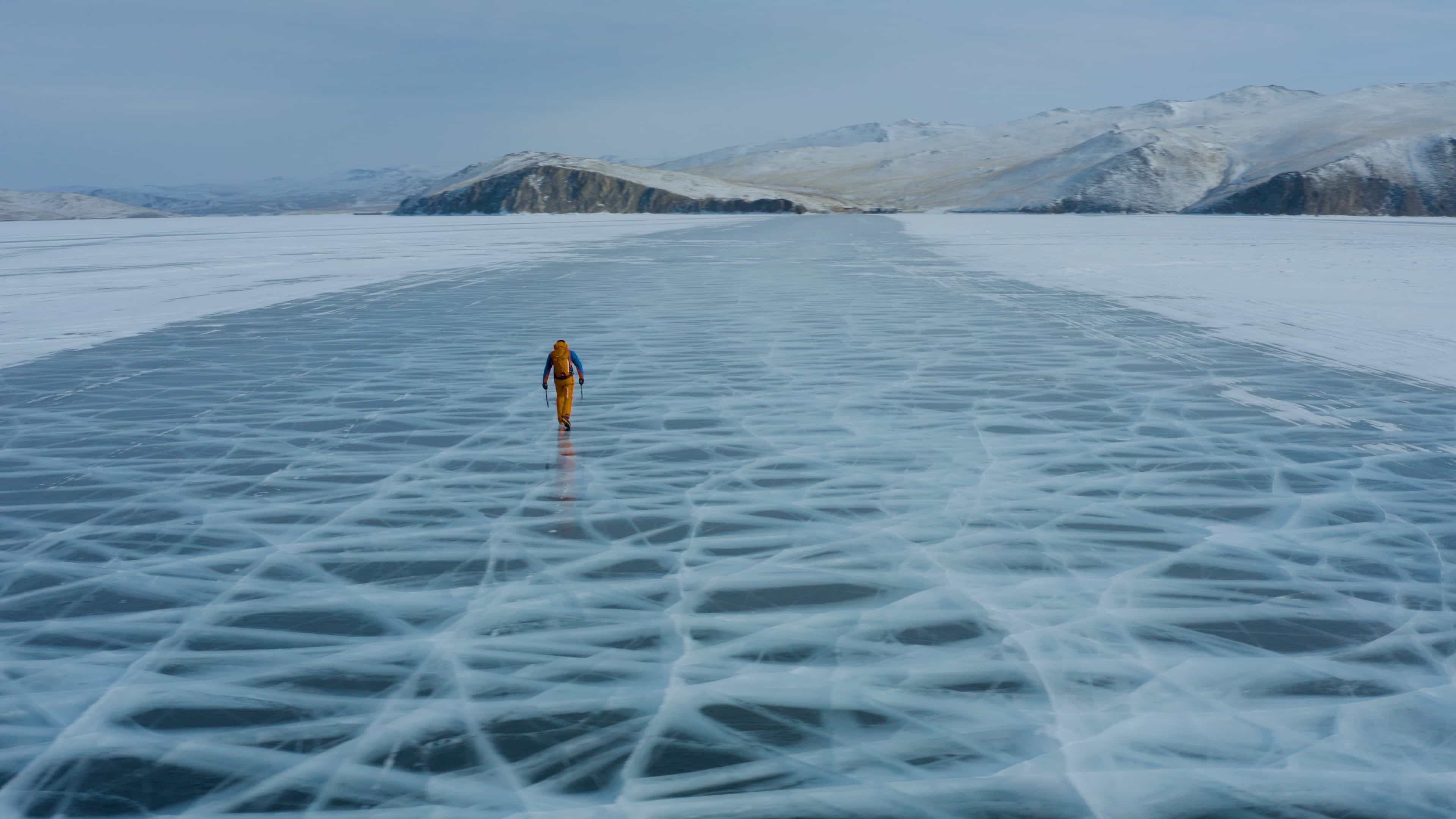 Dani Arnold walking over the frozen lake of Baikal