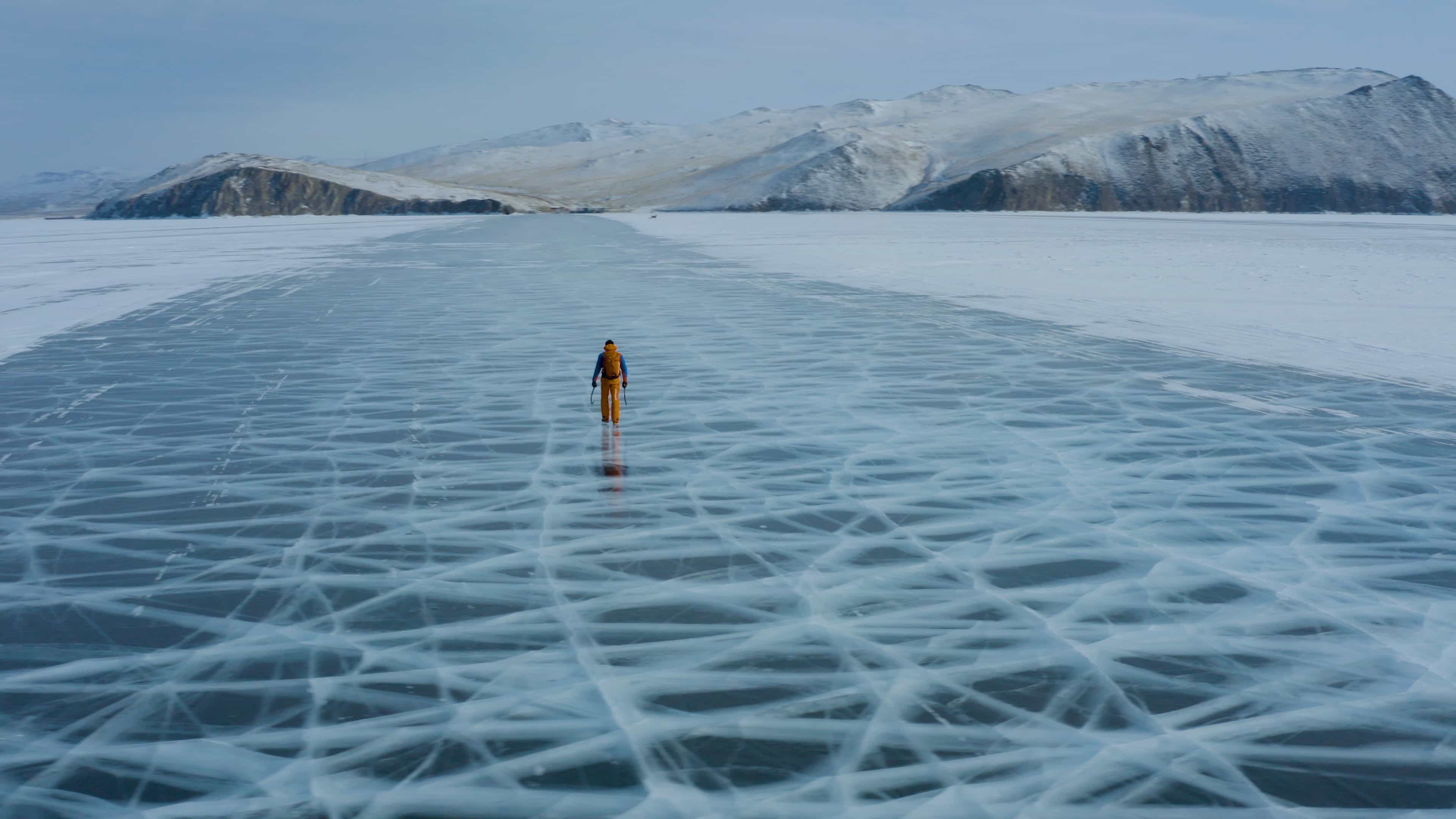 Dani Arnold walking over the frozen lake of Baikal